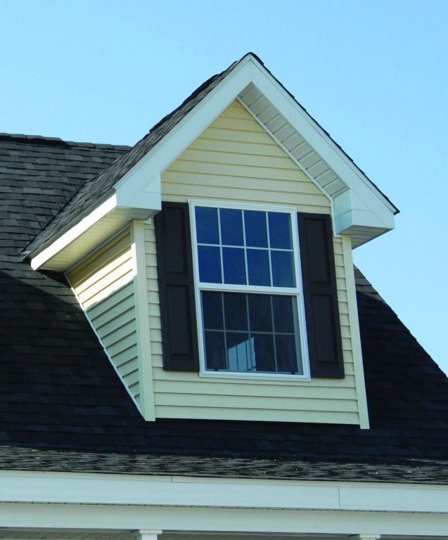 metal clad flat shed dormer over doorway porch design